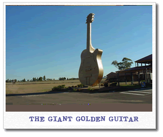 giant-golden-guitar.gif